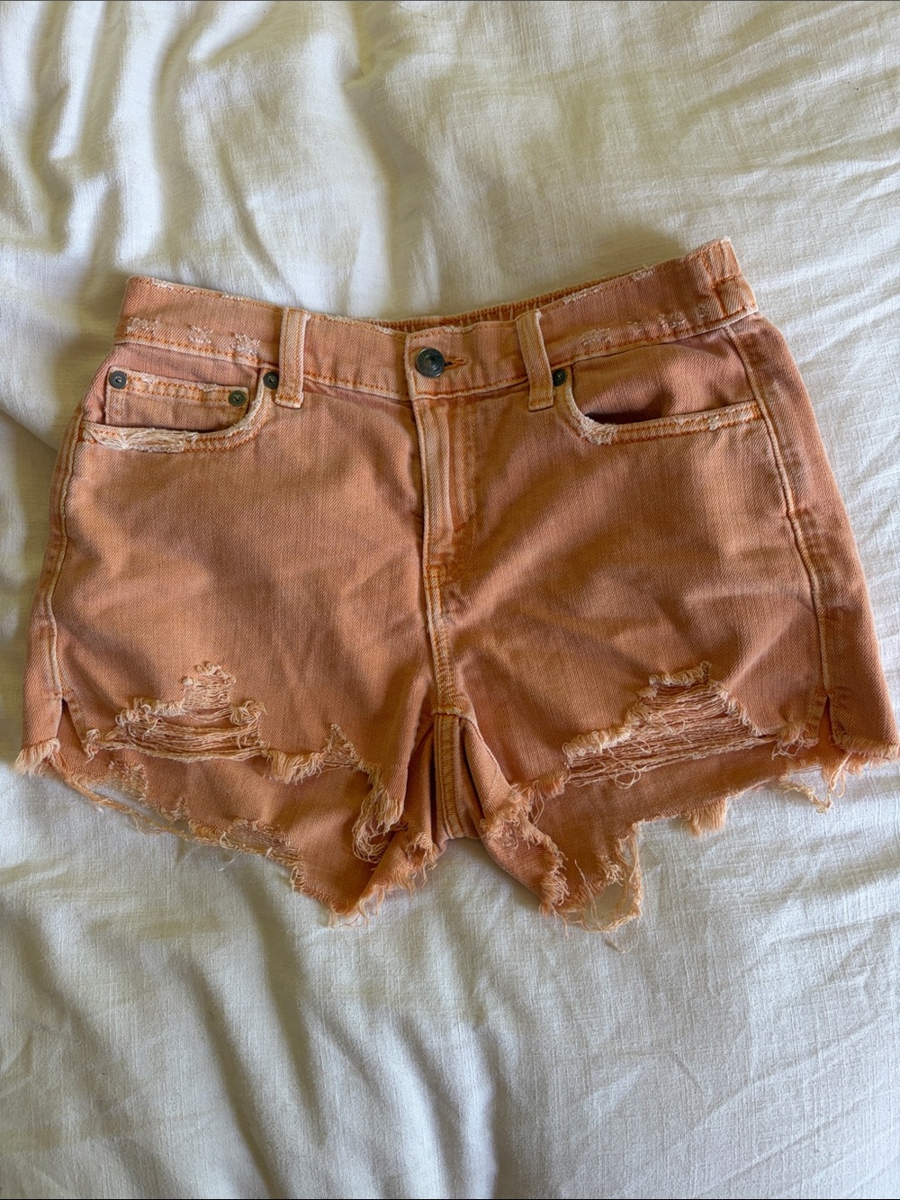 aerie Distressed High-Rise Jean Shorts in Dusty Peach